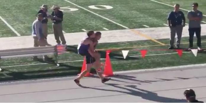 VIDEO: Sufre fractura, otro atleta lo carga hasta la meta... y descalifican a ambos