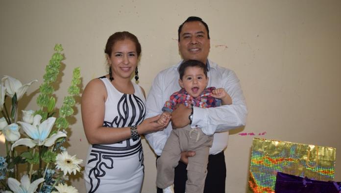 Salvador es bautizado en su primer año