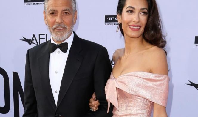 George y Amal Clooney donan 100 mil dólares a niños migrantes