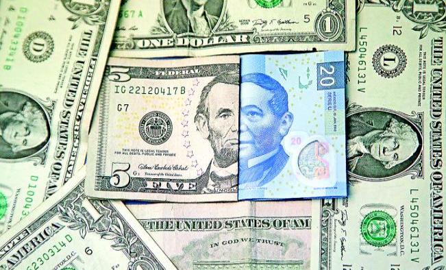 Dólar rompe otra vez la barrera de los $20