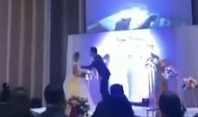 Exponen a novia infiel en plena boda; novio proyecta video íntimo