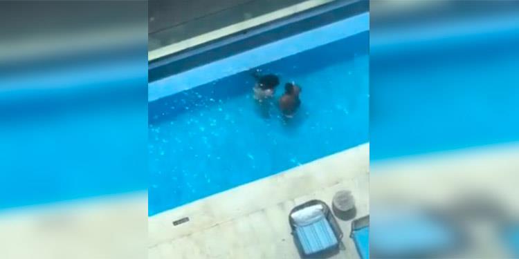 (VIDEO) Pareja es capturada teniendo relaciones sexuales en piscina clausurada de hotel y causa su cierre para desinfectar