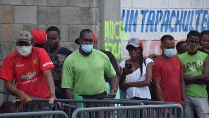 Detectan brote de covid entre migrantes haitianos en Chiapas