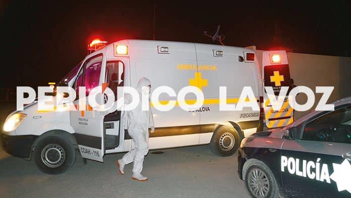 Hallan a mujer tirada en la calle
