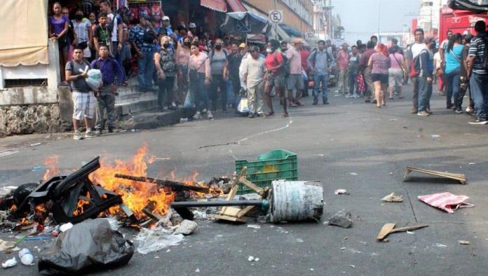Haitianos atacan a comerciantes de Tapachula tras detención de tres migrantes