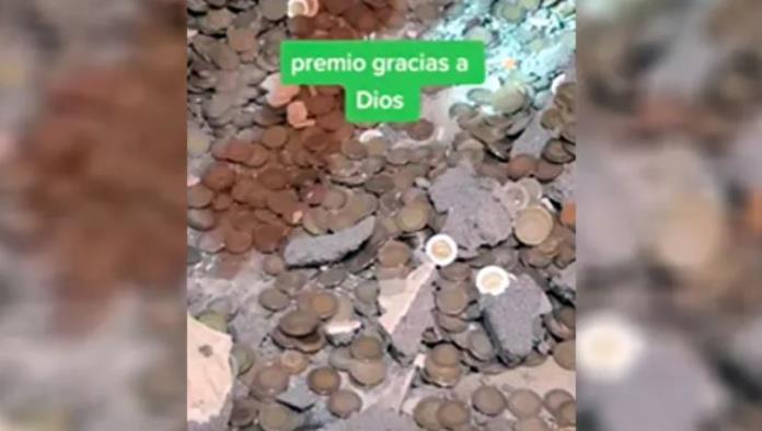 Tesoro escondido: derrumban pared y descubren una gran cantidad de monedas