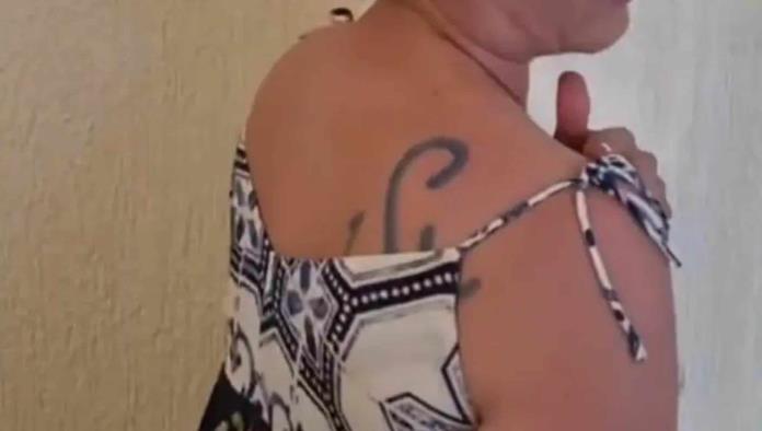 Esposa de notario afirma que fue marcada con hierro para ganado por su esposo