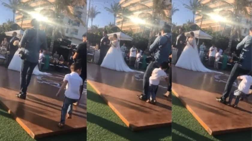Niño interrumpe entrada de novios y es aplastado por el fotógrafo