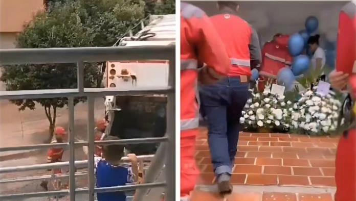 Recolectores de basura acuden a funeral de niño que siempre los saludaba