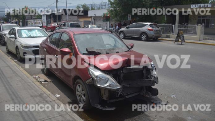 Causa escolta choque en la avenida Industrial