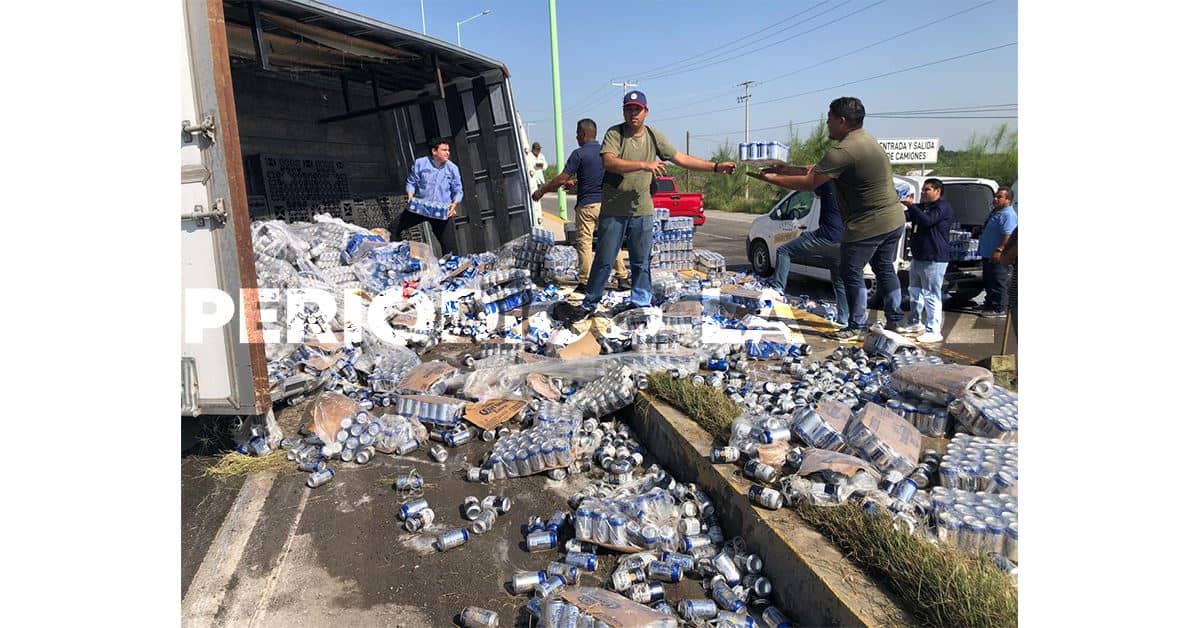 ´Riega´ cerveza en puente del Salinas