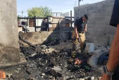 Domicilio Afectado por Quema de Basura del Vecino