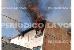 Se quema vivienda por corto en aparato de aire