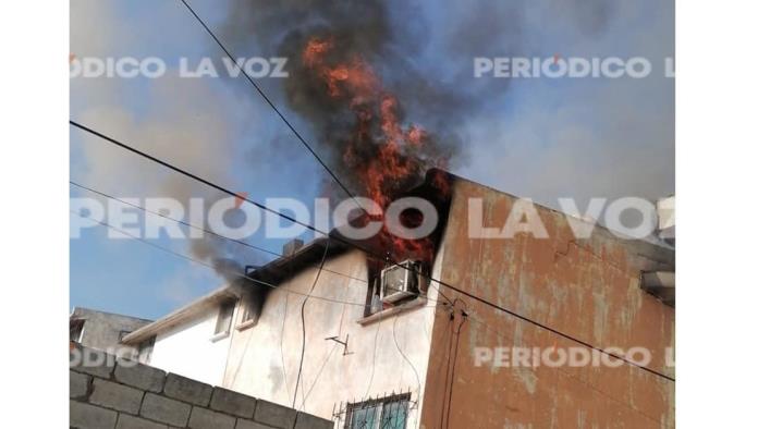 Se quema vivienda por corto en aparato de aire