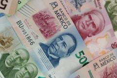 Cae el peso ante el dólar; AMLO niega que sea por la reforma judicial