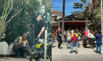 Protestan frente a casa de hombre que expulsó a trabajador de una banqueta