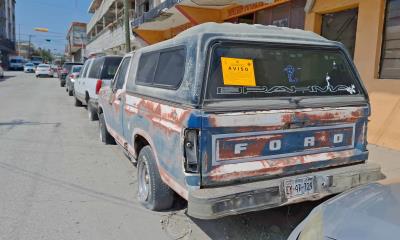 Realizan campaña para retirar autos abandonados