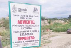 Multa de 20 mil por tirar basura en el rio