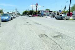 Deficiencia en bacheo expuesta por lluvias en Sabinas, Coahuila
