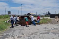 Trabajadores de AHMSA bloquean Puerta Cero en protesta