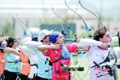 Competidores de arquería se preparan para la Gran Final