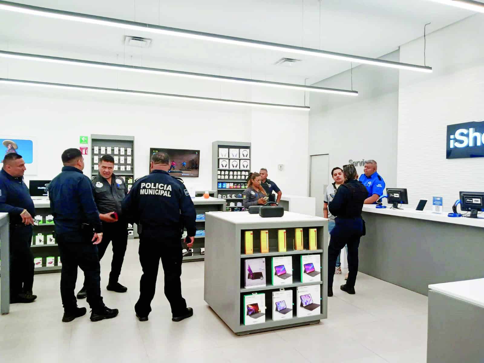 FGE investiga robo de equipos de telefonía en tienda I-Shop